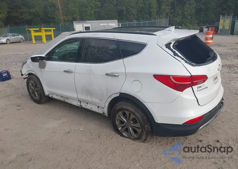 2014 Hyundai Santa Fe Sport 2.4L z USA, uszkodzony, nr VIN 5XYZUDLBXEG210414